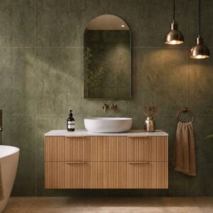 Topware fluted dark camel oak 1200mm bathroom vanity with olive green tiles and arch mirror cabinet with bronze taps