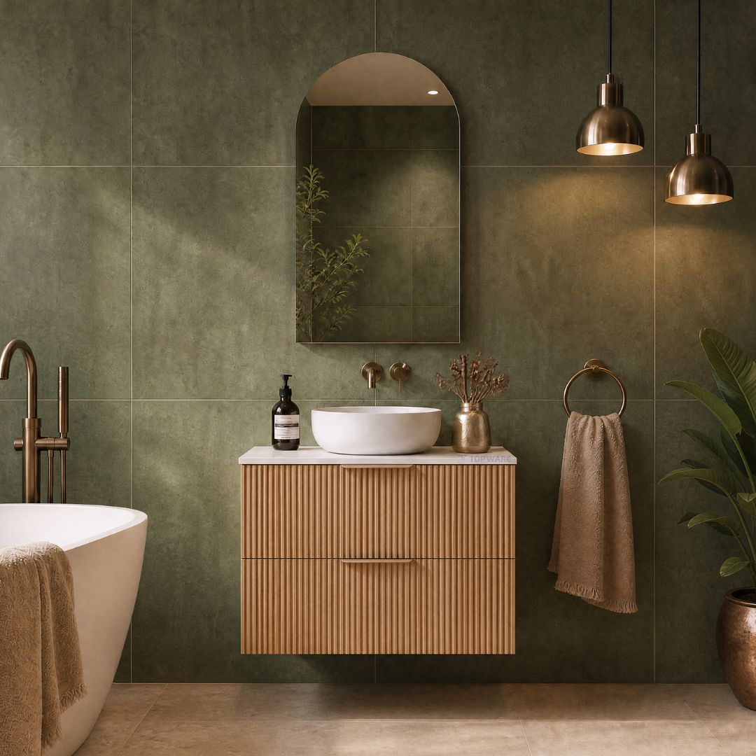 Topware fluted dark camel oak 750mm bathroom vanity with olive green tiles and arch mirror cabinet with bronze taps