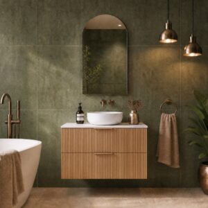 Topware fluted dark camel oak 900mm bathroom vanity with olive green tiles and arch mirror cabinet with bronze taps